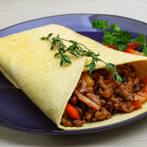 Burritos de solomillo de cerdo con piquillos caramelizados