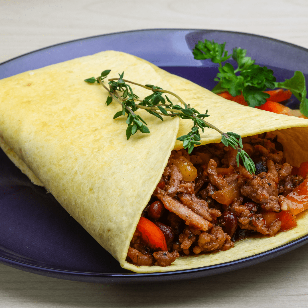 Burritos de solomillo de cerdo con piquillos caramelizados