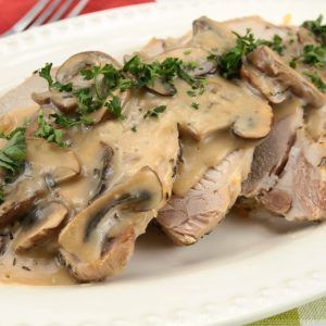Lomo de cerdo en salsa de champiñones y arroz