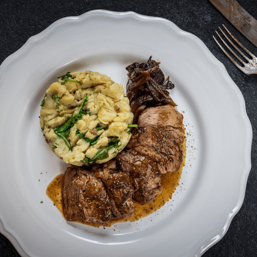 Solomillo de cerdo asado con papa cremosa