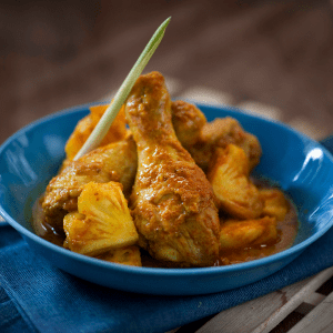Pollo con salsa de piña y soja al curry con arroz blanco